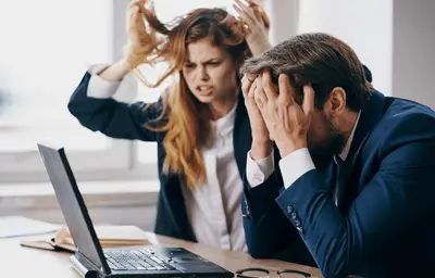 Frustrated business team in virtual meeting